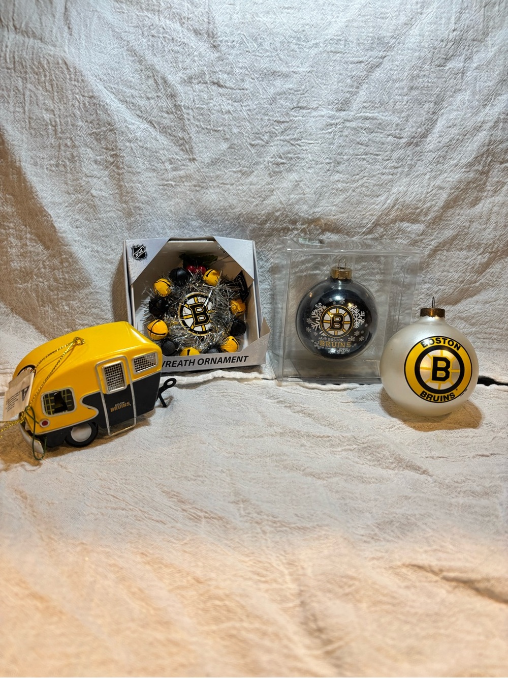 4 NHL Boston Bruins Silver and Black Ornament Set